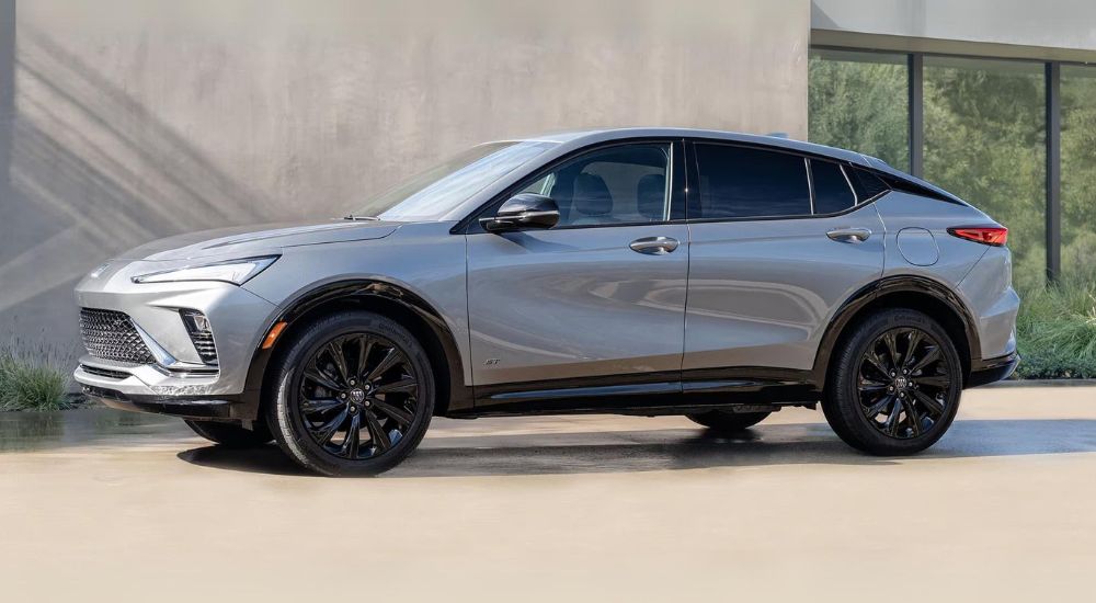 A silver 2025 Buick Envista ST is shown from the side after visiting a Buick dealer.
