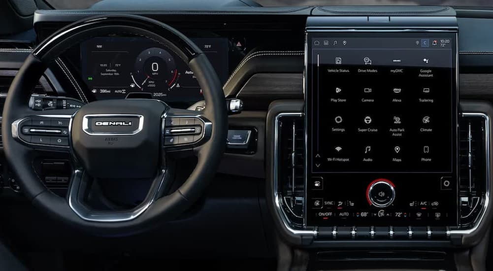 The black dash in a 2025 GMC Yukon at a GMC dealer near Morris.