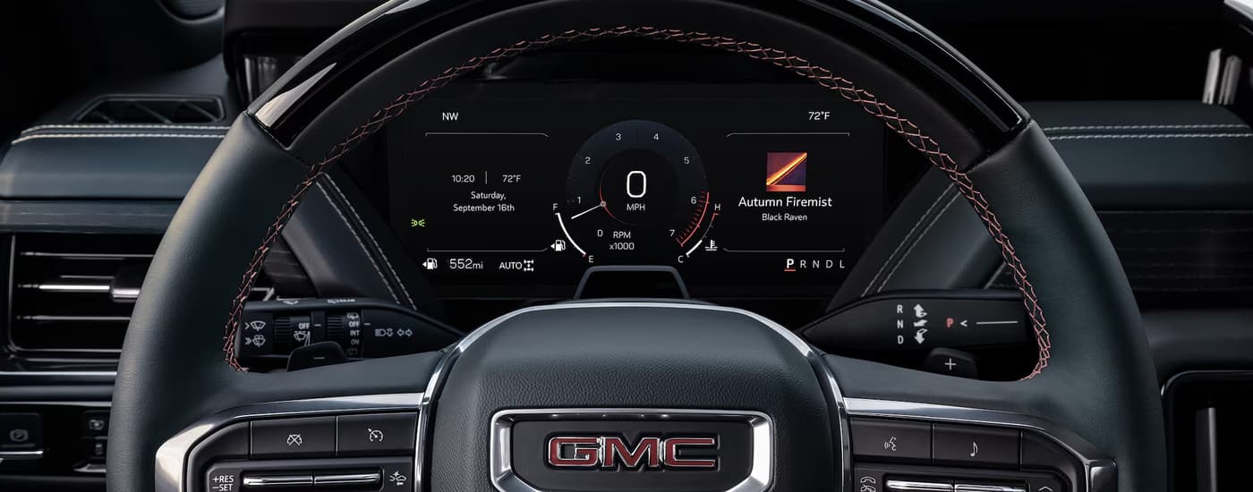 Steering wheel and digital gauge cluster in a 2026 GMC Yukon