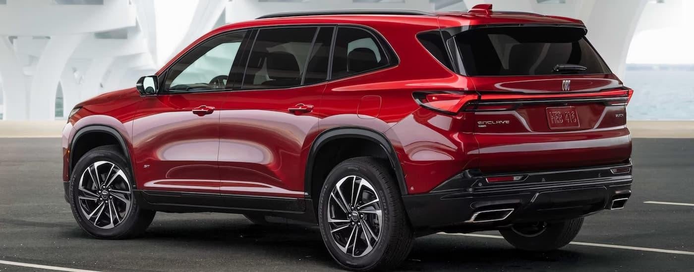 A red 2025 Buick Enclave is parked in a lot after leaving a Buick dealer near Mendota.