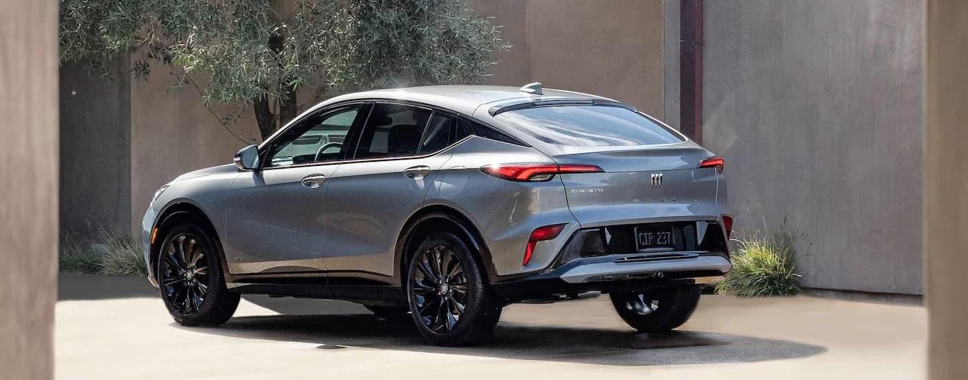 A silver 2025 Buick Envista is parked in a driveway after leaving a Buick dealership near Morris.
