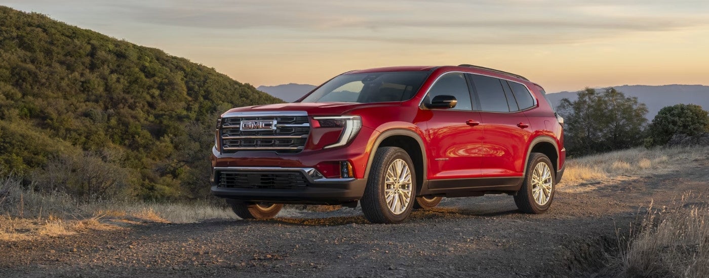 A red 2025 GMC Acadia from a GMC dealer near Princeton