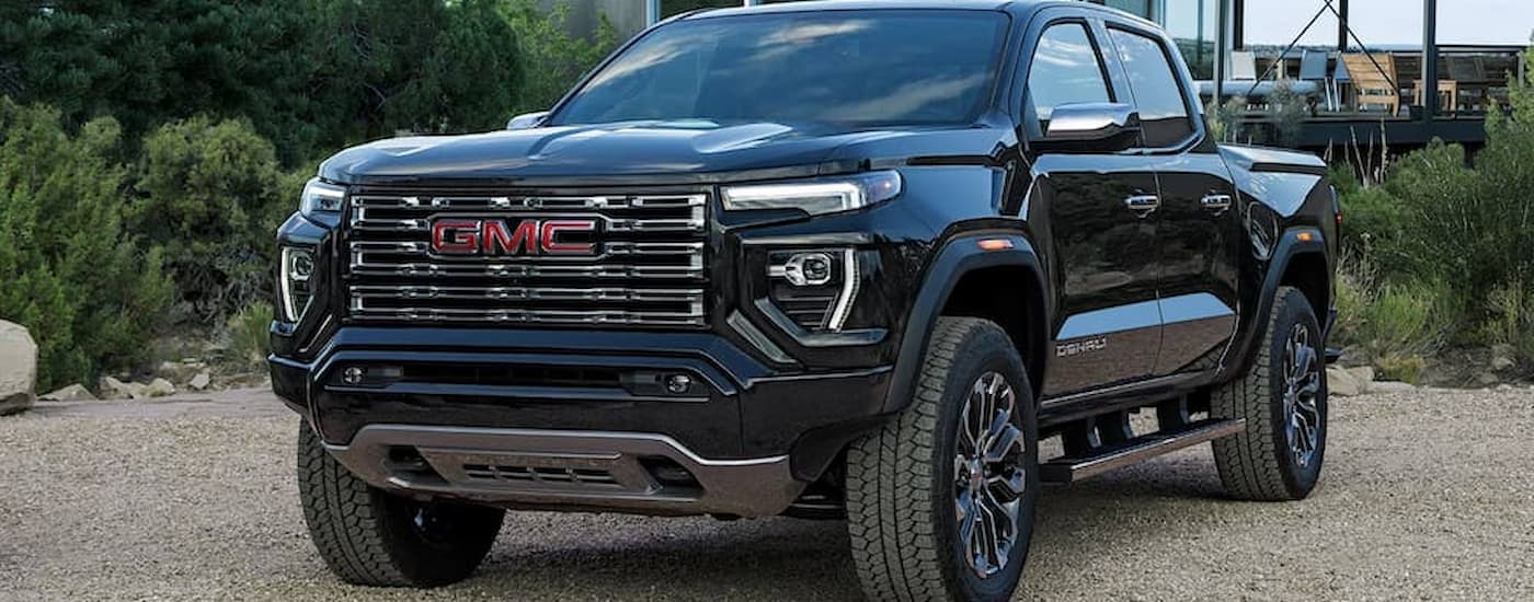 A black 2026 GMC Canyon parked for sale near Mendota.